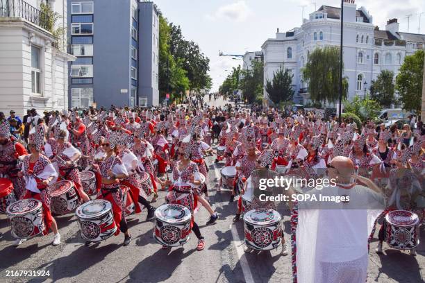 Drummers perform in the parade on the second day of this year's Notting Hill Carnival. The annual event in London's popular Notting Hill area...