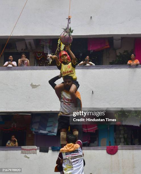 Govinda Mandal breaking Dahi handi at Currey Road area, Dahi handi during the Dahi Handi Festival on August 27, 2024 in Mumbai, India.