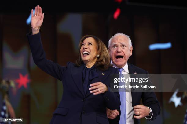 Democratic presidential nominee, U.S. Vice President Kamala Harris and Democratic vice presidential nominee Minnesota Gov. Tim Walz celebrate during...