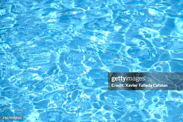 poolside blue - water surface stock pictures, royalty-free photos & images