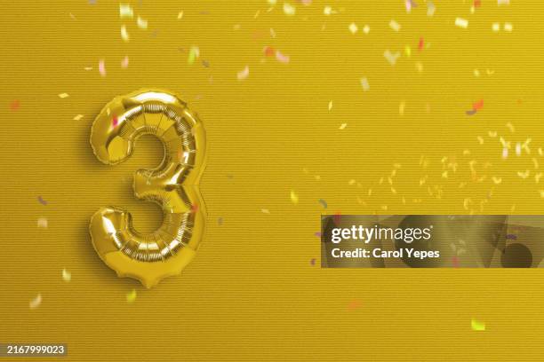 number 3 foil balloon - helium stock pictures, royalty-free photos & images