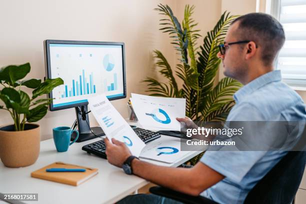 143 Man Working Computer Paper Stock Photos, High-Res Pictures, and ...
