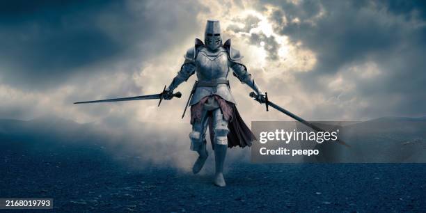 medieval knight walking with swords - harnas stockfoto's en -beelden