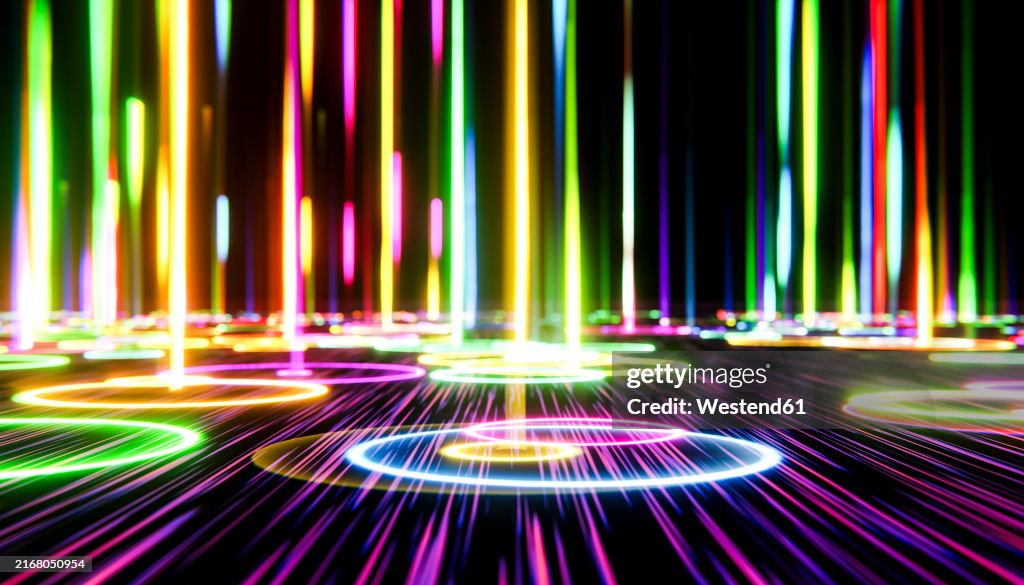3D render of falling multi colored laser lights on black background
