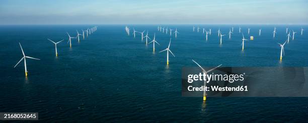 offshore wind farm in dutch part of north sea - noordzee stockfoto's en -beelden