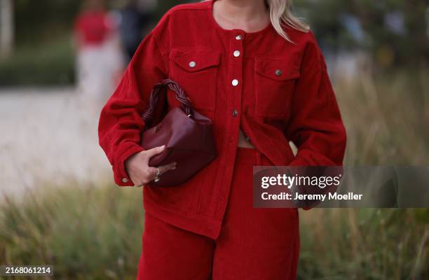 Siân Eastment-Williams is seen wearing a matching two-piece in red corduroy from Aligne, consisting of a buttoned jacket with two chest pockets, and...