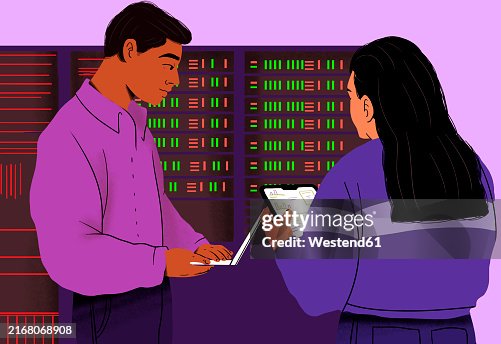 IT professionals examining data in server room IT professionals examining data in server room
