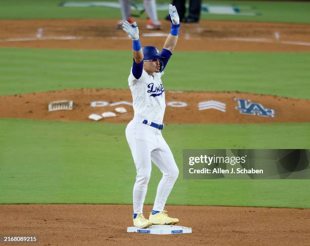 Los Angeles, CA Dodgers first baseman Enrique Hernández celebrates at second base after hitting a double in the fifth inning against the Orioles at...