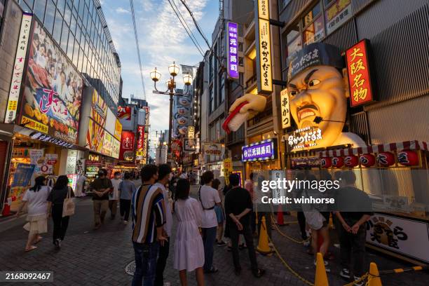 dotonbori in osaka, japan - japanese food stock pictures, royalty-free photos & images