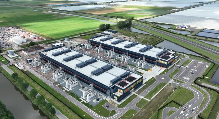 https://media.gettyimages.com/id/2168102069/video/new-constructed-datacenter-ams-13-and-ams-14-in-middenmeer-muncipality-of-hollandse-kroon.jpg?b=1&s=640x640&k=20&c=9OepsvEqDP1g3HjmGkdaNC-RT1vUmYcP1BHlVC2fEQU=