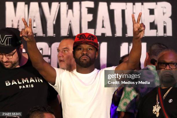 Floyd Mayweather Jr does the peace and love sign during the Weigh-Ins ahead of his exhibition fight with John Gotti III at Big Bola Casino on August...