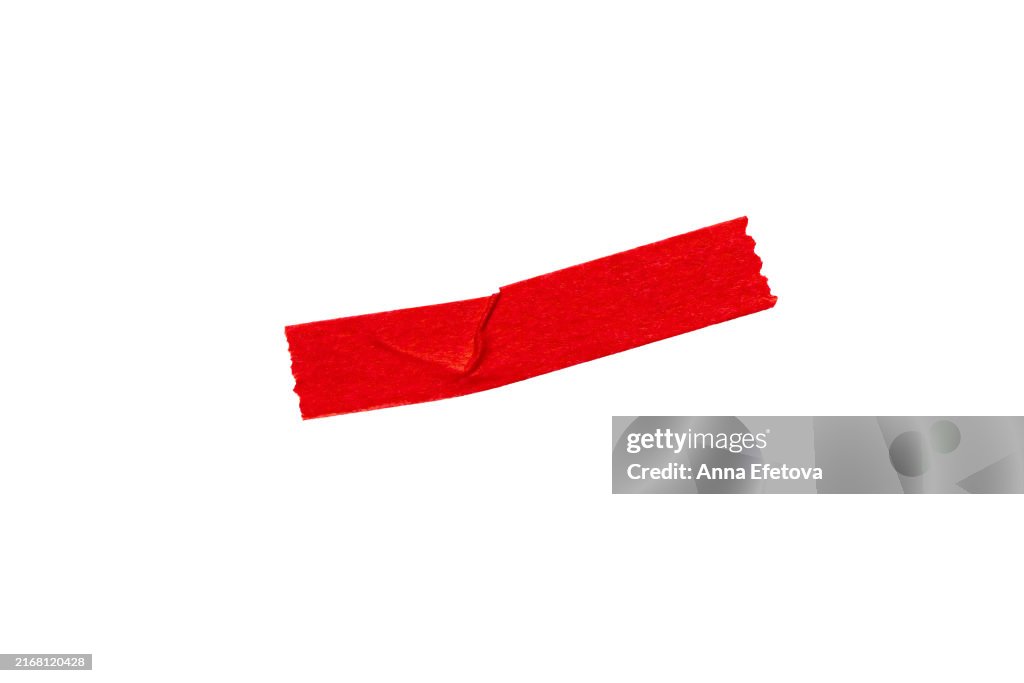 Paper adhesive tape. Macro photography. Festive design element for multiple types of graphic design decorations, scrapbooking. Isolated on white background, cut out. Textured, high resolution. Crumpled, isolated on white background. Red color