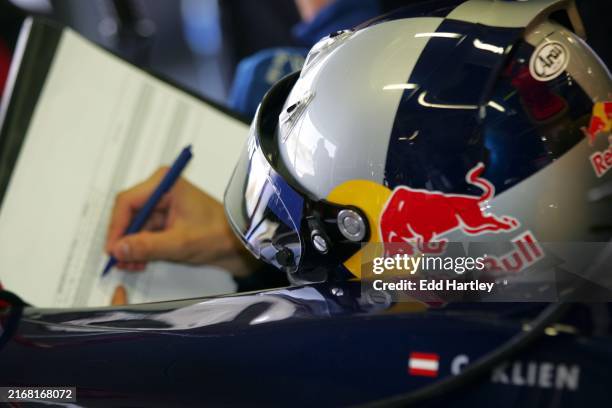 Christian Klien Red Bull Racing writes notes. Formula One Testing, Jerez, Spain, 23 June 2005. DIGITAL IMAGE