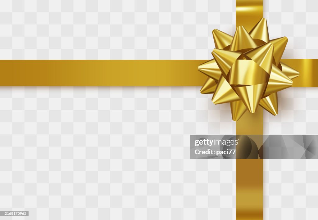 装飾的な金色の弓。クリスマス、新年、ギフトカード、背景に分離されたプレゼント装飾要素のためのリアルな金色のリボン