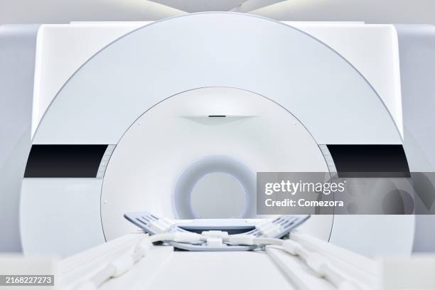 low angle view of modern mri machine - medical technical equipment stock pictures, royalty-free photos & images