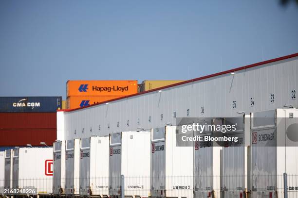 Containers parked at a DB Schenker logistics hub in Grossbeeren, Germany, on Thursday, Aug. 29, 2024. Danish transport group DSV A/S and a consortium...