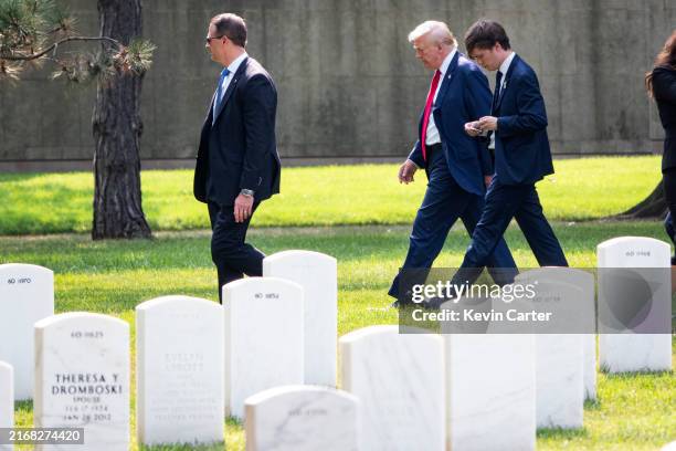 Republican presidential nominee former U.S. President Donald Trump leaves Section 60 of Arlington National Cemetery after he attended a ceremony...