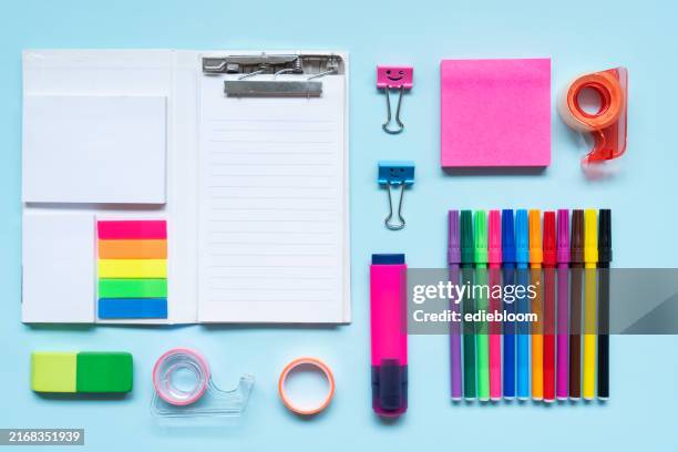 school and office supplies on blue background - eraser stock pictures, royalty-free photos & images