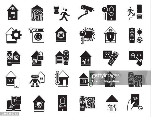 smart home and security technology icon set in solid black, featuring surveillance cameras, remote controls, and automation systems - intercom stock illustrations