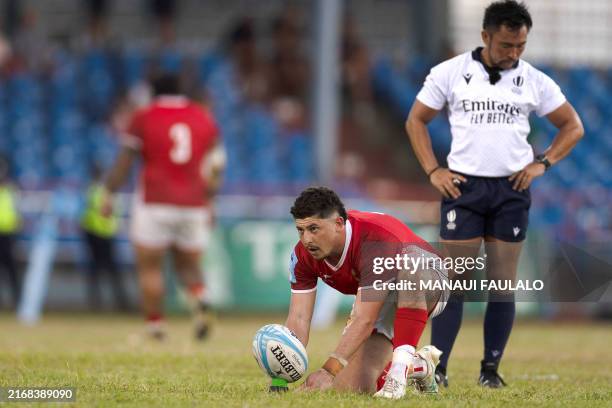 Tonga's Patrick Pellegrini takes a penalty kick during the Rugby Union Pacific Nations Cup match between Samoa and Tonga at the Apia Park in Samoa's...