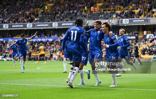 Joao Felix of Chelsea celebrates scoring his team's sixth goal with teammates Noni Madueke, Malo Gusto and Pedro Neto during the Premier League match...