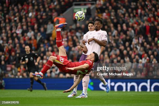 Diogo Jota of Liverpool creates a acrobatic shot during the Premier League match between Liverpool FC and Brentford FC at Anfield on August 25, 2024...