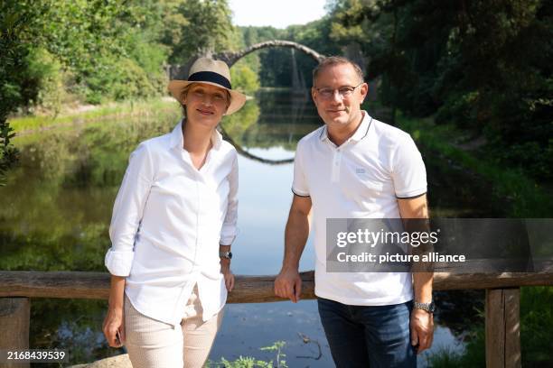 August 2024, Saxony, Kromlau: Tino Chrupalla, AfD federal chairman and AfD parliamentary group leader, and Alice Weidel, AfD federal chairman, stand...
