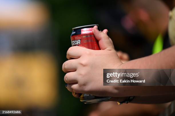 Fan holds a Rockstar Energy drink during the women’s street final during day three of the Rockstar Energy Open on August 25, 2024 in Portland, Oregon.
