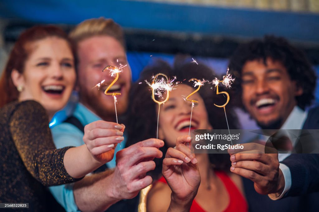 Two couples with sparklers