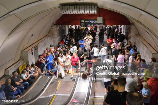 People hide in the Kyiv subway during a massive Russian missile attack on August 26, 2024 in Kyiv, Ukraine. Russian army carried out a combined...