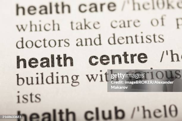 health centre, text in dictionary. macro shot. selective focus - macro landscape stock illustrations