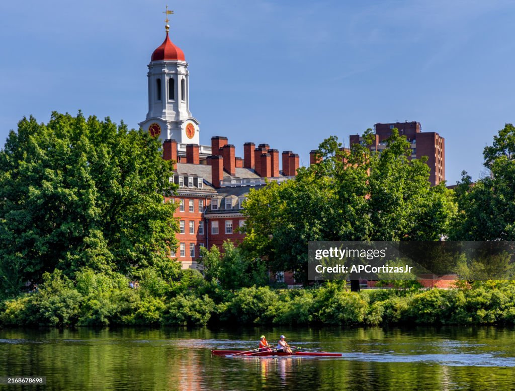 Rowers in a double scull - Charles River - Dunster House - Harvard University - Cambridge Massachusetts