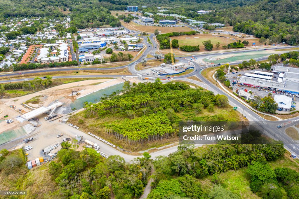 Construction activity at Smithfield Cairns site showing progress on roadway and surrounding infrastructure in the region