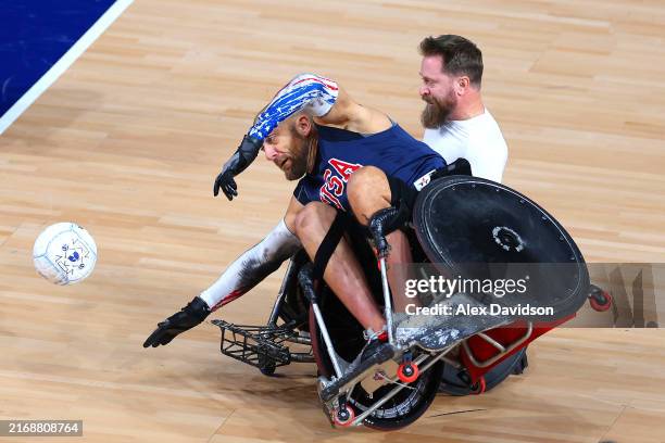 Chuck Melton of Team United States is tackled during a training session ahead of the Wheelchair Rugby at the Paris 2024 Summer Paralympic Games at...