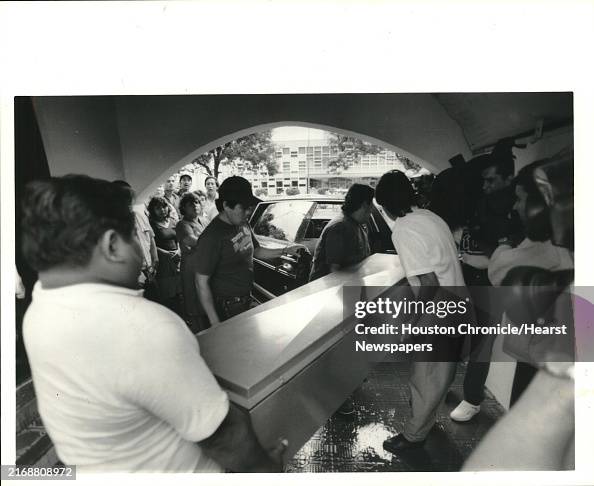 The body of Mark Kilroy is loaded into a hearse on April 13 in... News ...