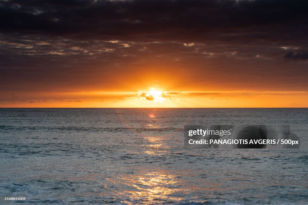 Scenic view of sea against orange sky,Hawaii,United States,USA