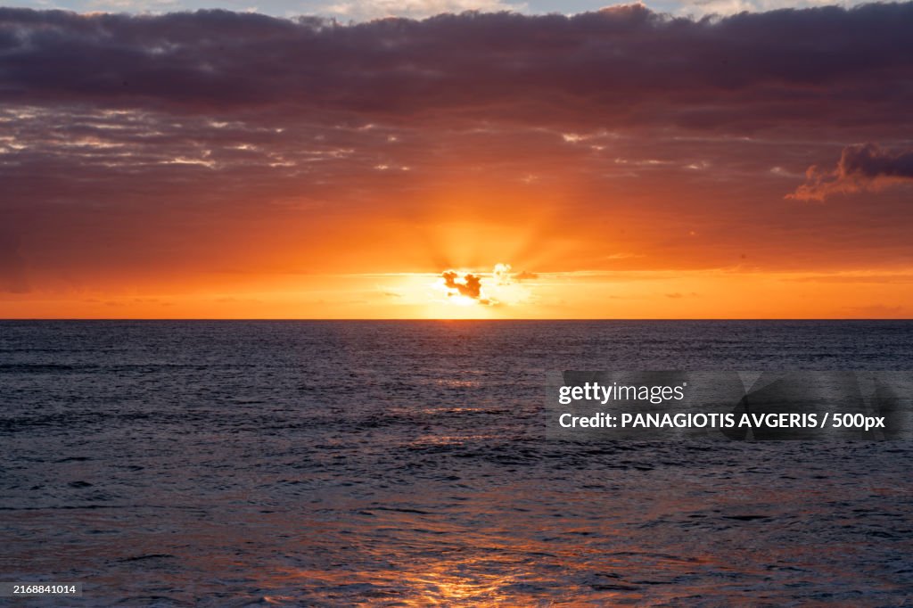 Scenic view of sea against orange sky,Hawaii,United States,USA
