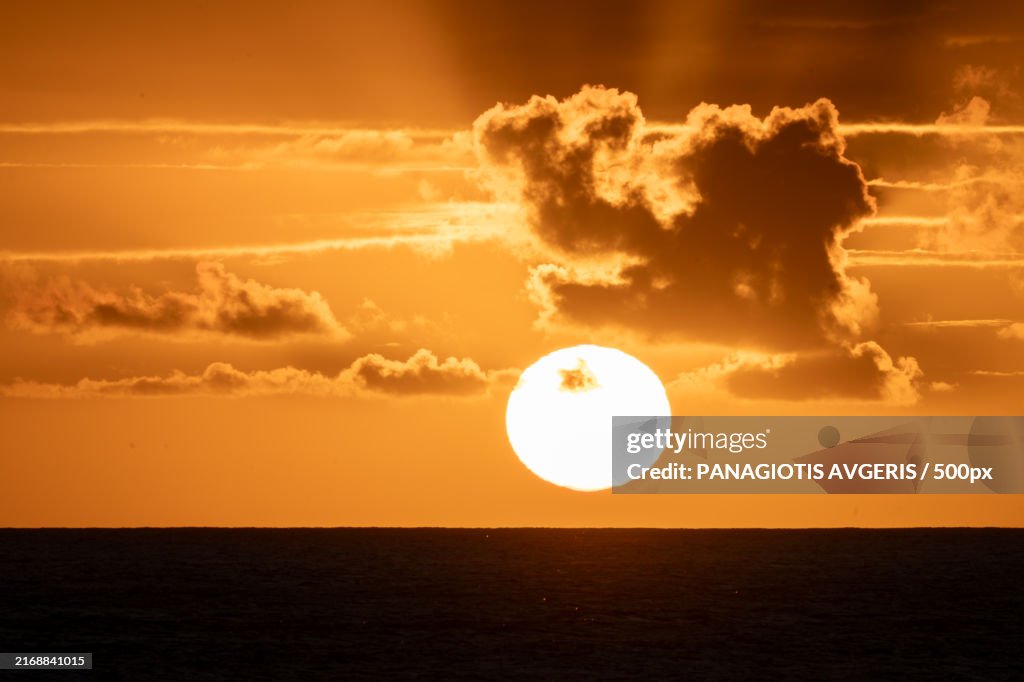 Scenic view of sea against orange sky,Hawaii,United States,USA
