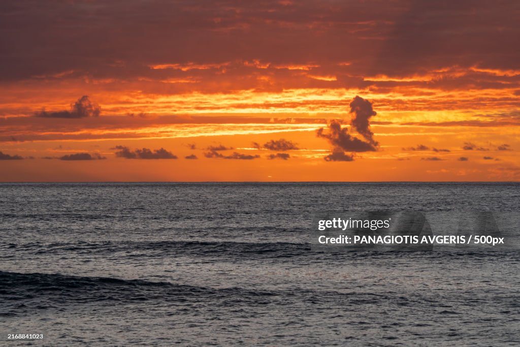 Scenic view of sea against orange sky,Hawaii,United States,USA