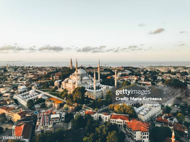 aerial view of suleymaniye mosque at sunrise, overlooking the bosphorus in istanbul, türkiye. - istanboel europese deel stockfoto's en -beelden