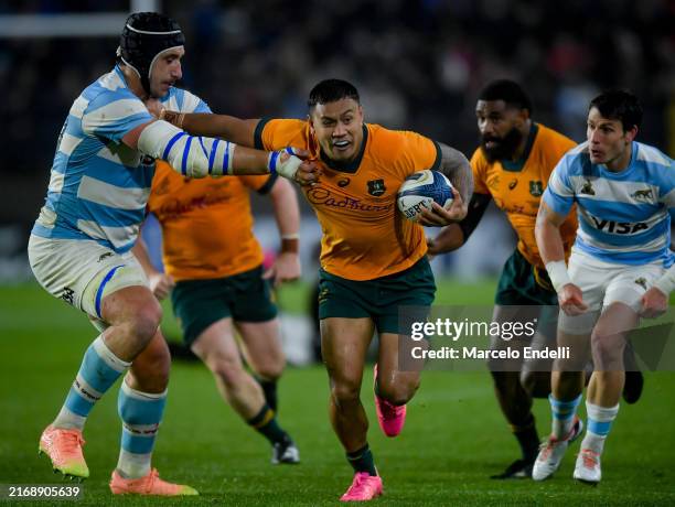 Allan Alaalatoa of Australia evades a tackle from Tomas Lavanini of Argentina during the Rugby Championship 2024 match between Argentina and...