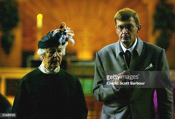 The Duchess of Devonshire and David Freeman enter St. James's Church as they arrive at the Service of Thanksgiving to Celebrate the Life and Work of...
