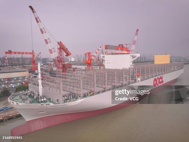 Aerial view of 24,188 TEU eco-friendly mega vessel "OOCL Portugal" at berth at a shipyard on August 27, 2024 in Nantong, Jiangsu Province of China.