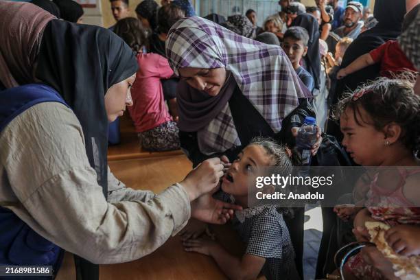 Child is vaccinated within the polio vaccination campaign covering more than 640,000 children under the age of 10, in Deir al Balah, Gaza on...