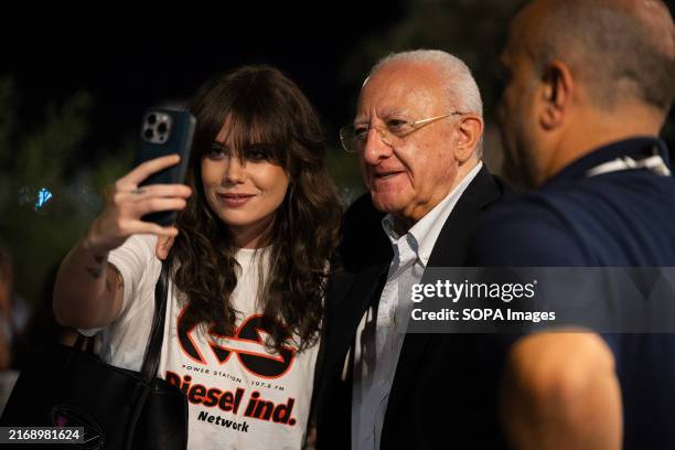 Italian singer Angela Ciancio aka Lil Jolie takes a selfie with the President of the Campania Region Vincenzo De Luca at the Salerno Pitti Pizza &...