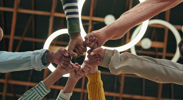 https://media.gettyimages.com/id/2169006553/video/team-hands-and-fist-bump-from-below-for-goal-success-and-collaboration-on-campus-diverse.jpg?b=1&s=640x640&k=20&c=3yC8P79QId6de3SPoAqLAU9MhBISusGlppt1vOaUamE=