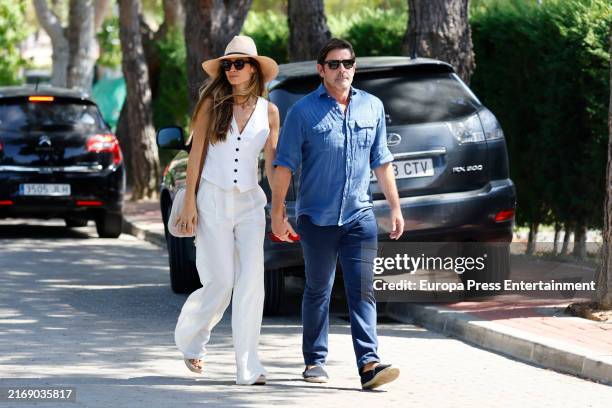 Ariadne Artiles and Jose Maria Garcia Fraile after the burial of Caritina, on August 28 in Madrid, Spain.