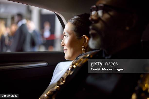 celebrities arriving in car at film festival - celebrities stock pictures, royalty-free photos & images