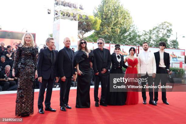 Catherine O'Hara, Willem Dafoe, Michael Keaton, Monica Belluci, Tim Burton, Winona Ryder, Jenna Ortega, Justin Theroux and Arthur Conti attend a red...