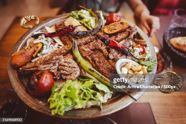 high angle view of food served on table - cucina del medio oriente foto e immagini stock